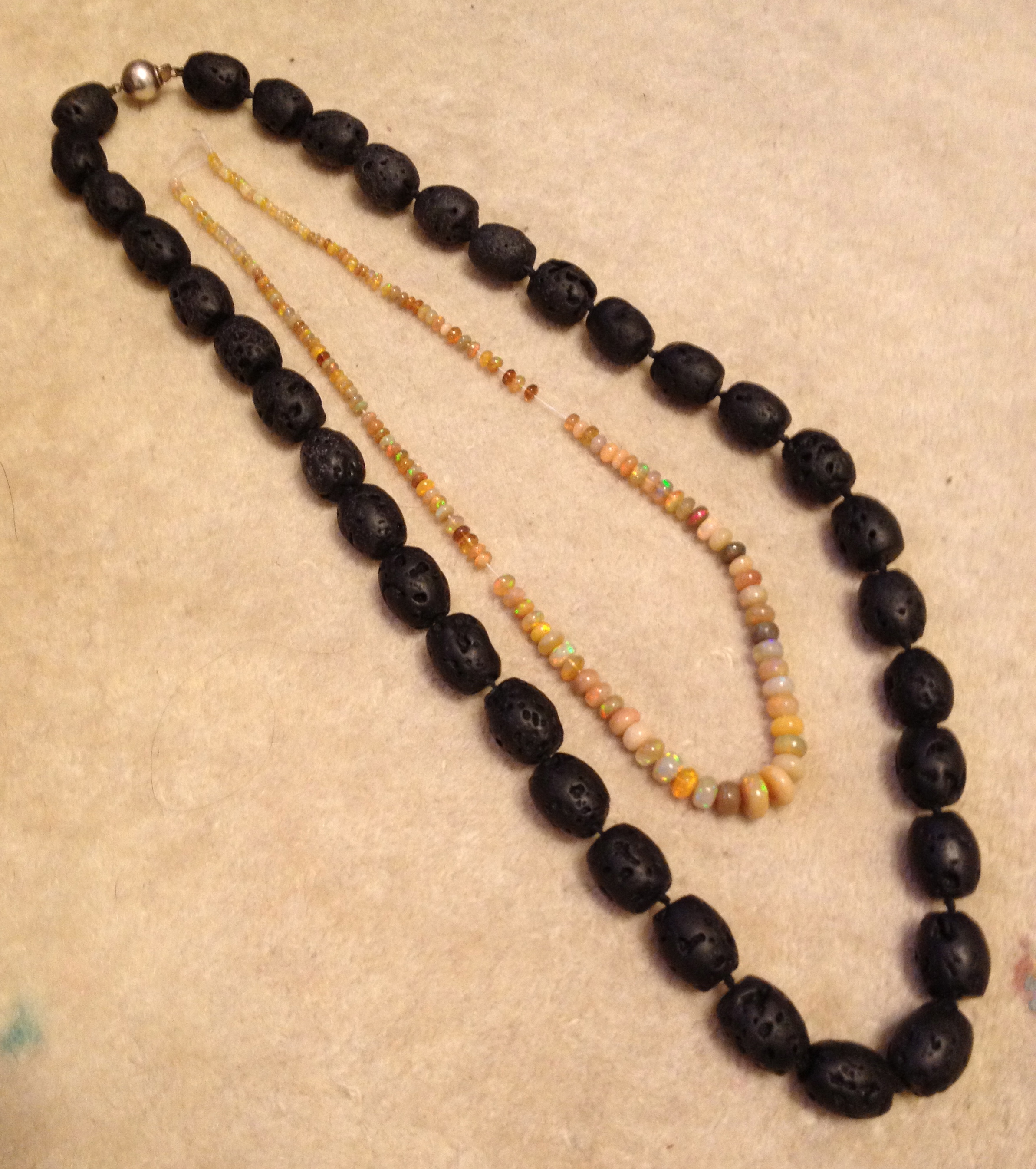 Opal within Lava necklaces