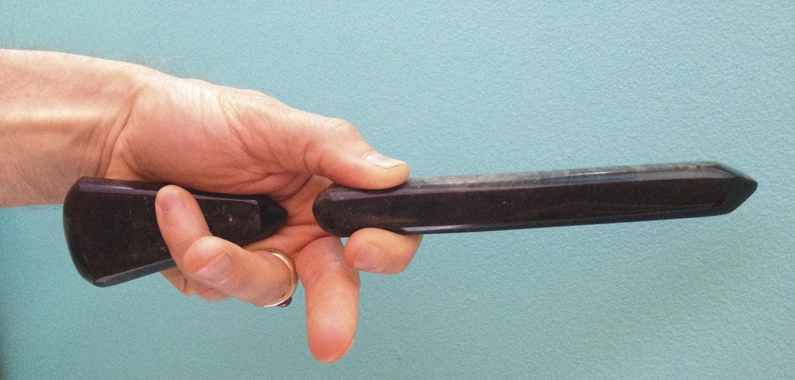 Obsidian wands - one backing the other - in clearing the way forward