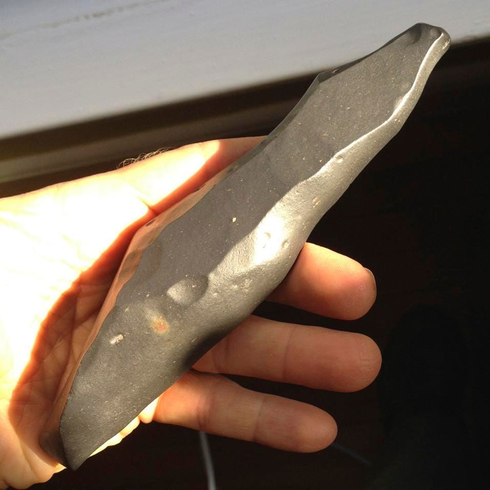 Basalt - one of the more ancient of stones - here shattered and was polished by the wind & sand over eons, to make a ventifact that is powerful in clearing and protecting.