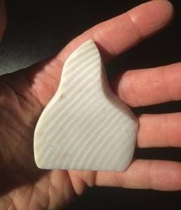 It is white, is it beige - is the pattern natural or real - what is the play of light here (on this Zebra Jasper)...