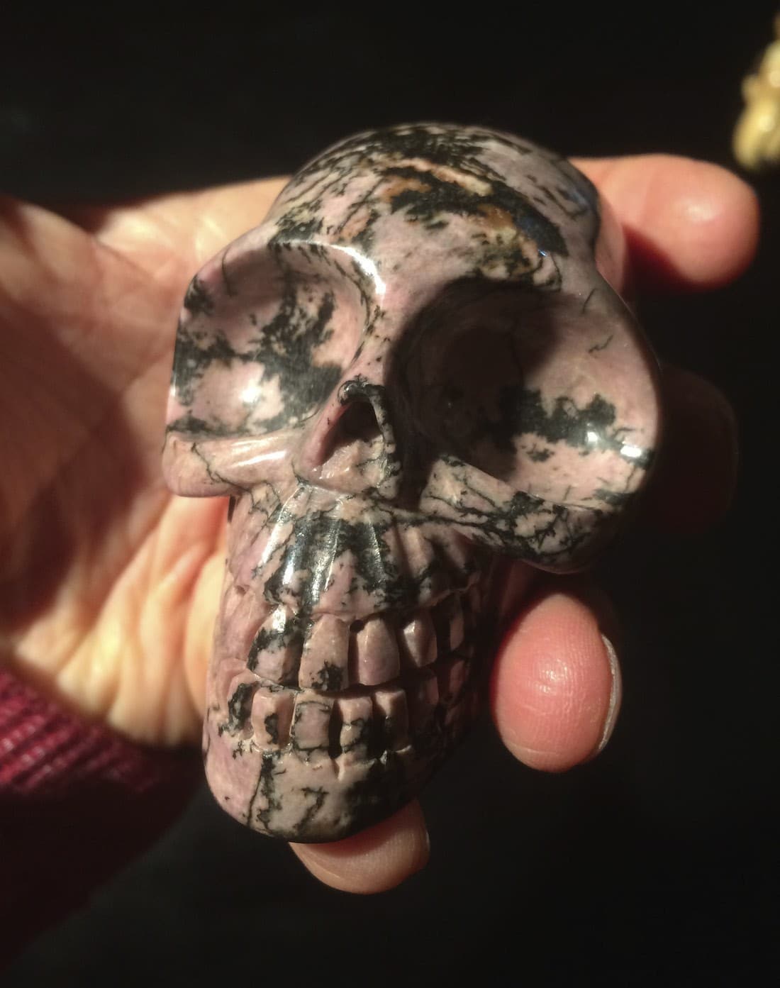 Rhodonite (carving) Alien crystal skull, healing crystal
