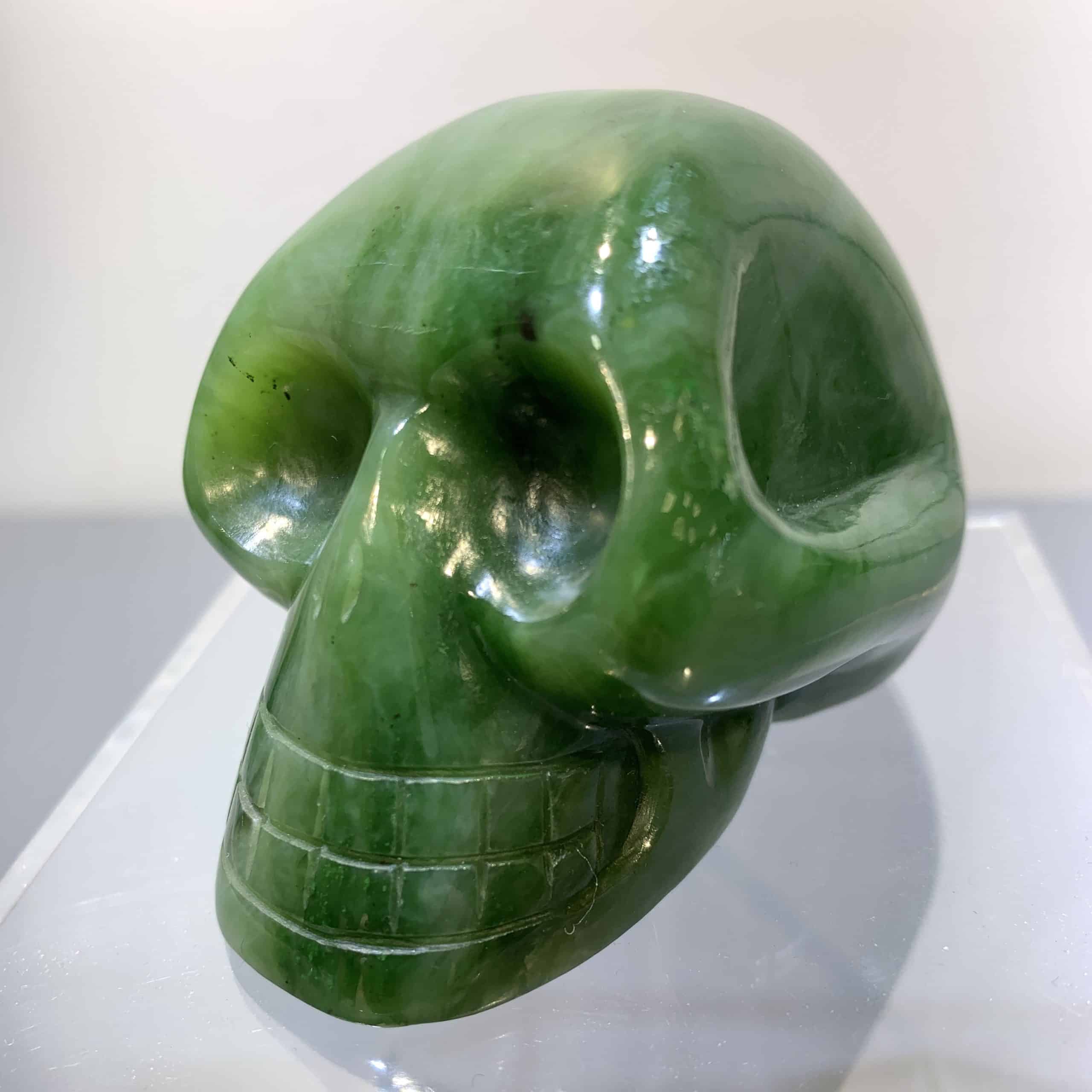 Jade (Nephrite) crystal skull carving, lighter green tone healing crystal