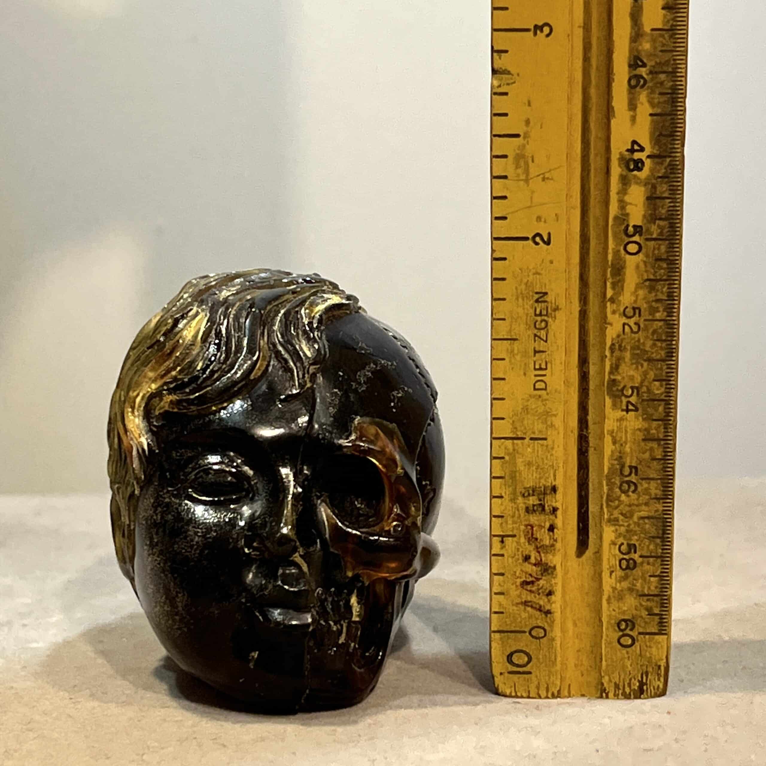 Amber (carving) blue fluorescent 'child skull within' healing crystal - Image 7