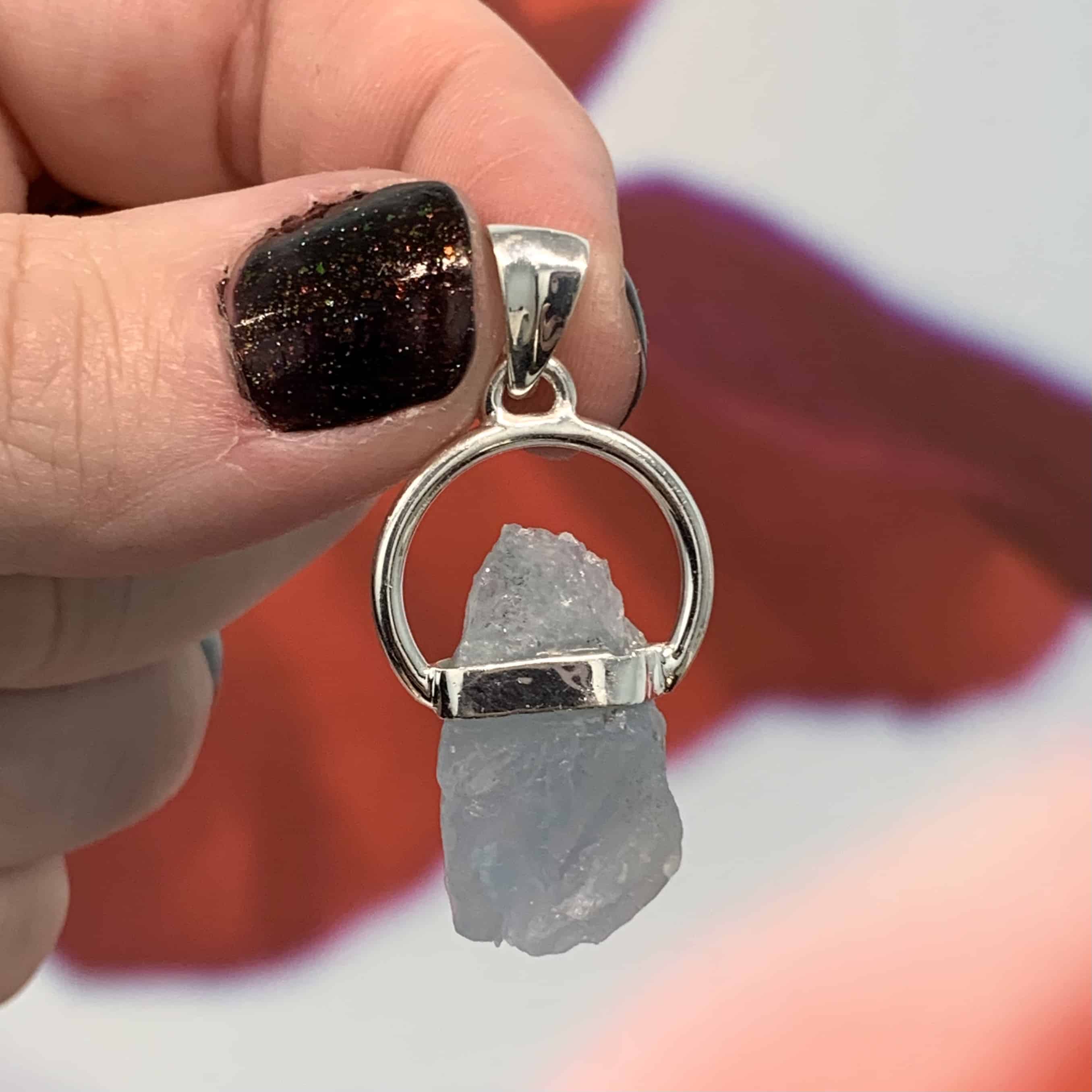 Aquamarine (blue) bezeled O-ring pendant healing crystal - Image 2