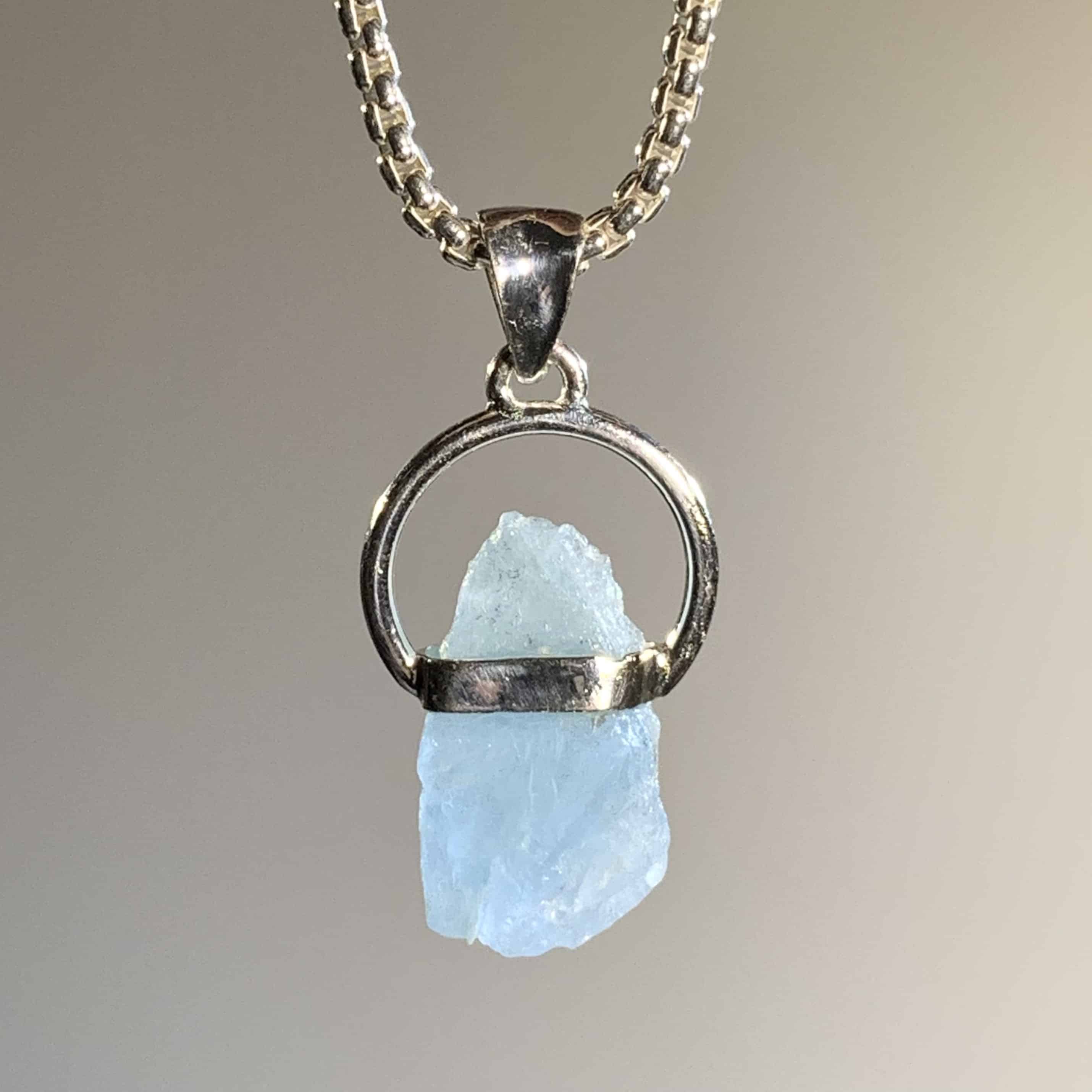 Aquamarine (blue) bezeled O-ring pendant healing crystal