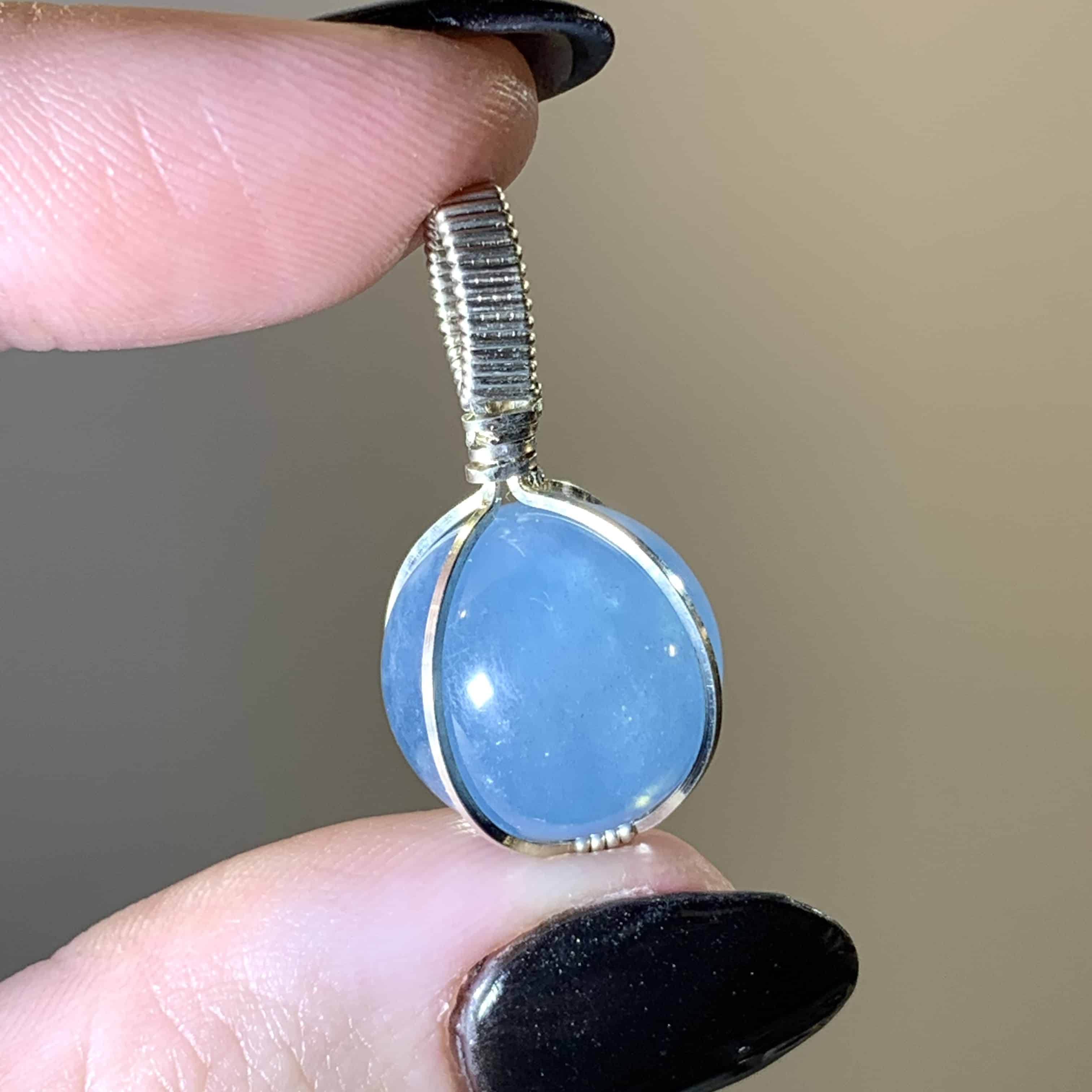 Aquamarine (blue) wire wrapped sphere pendant healing crystal