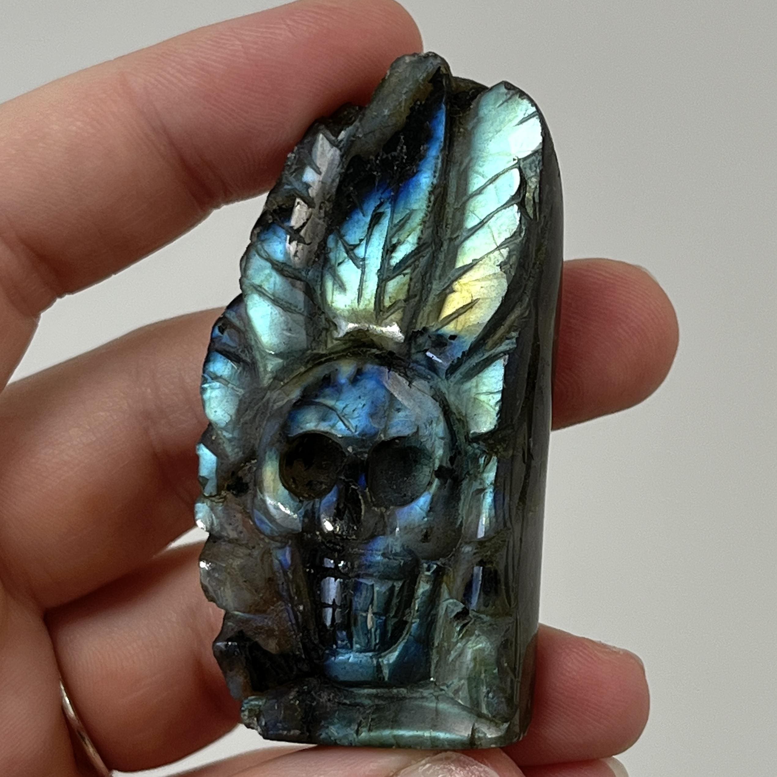 Labradorite (carving) crystal skull with feather head dress healing crystal