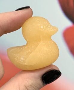 Orange Calcite 'rubber duckie' standing stone carving healing crystal