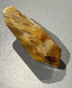 Amphibole Quartz 'auburn hair' point