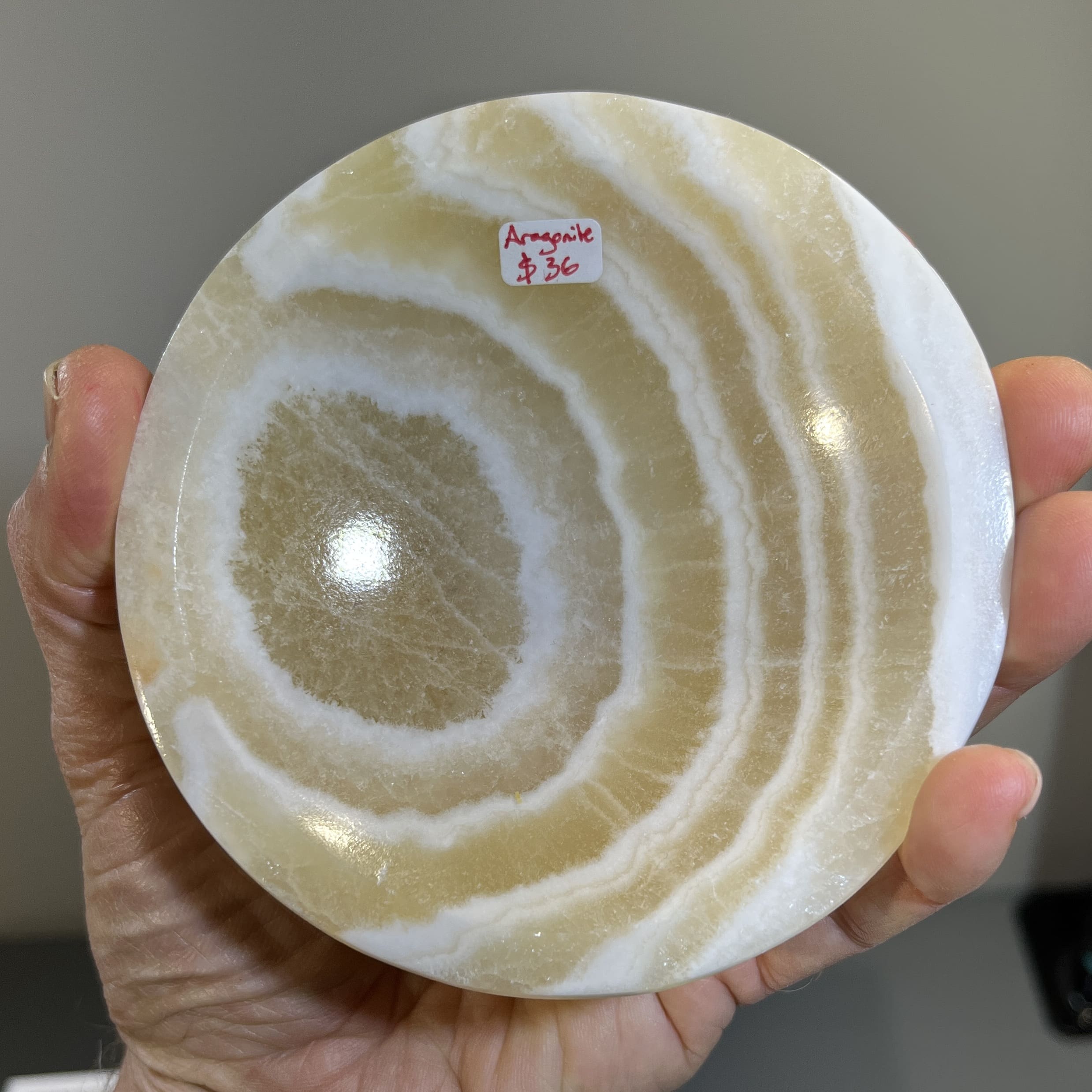 Aragonite 'bullseye' bowl, good size and pattern, soft healing crystal