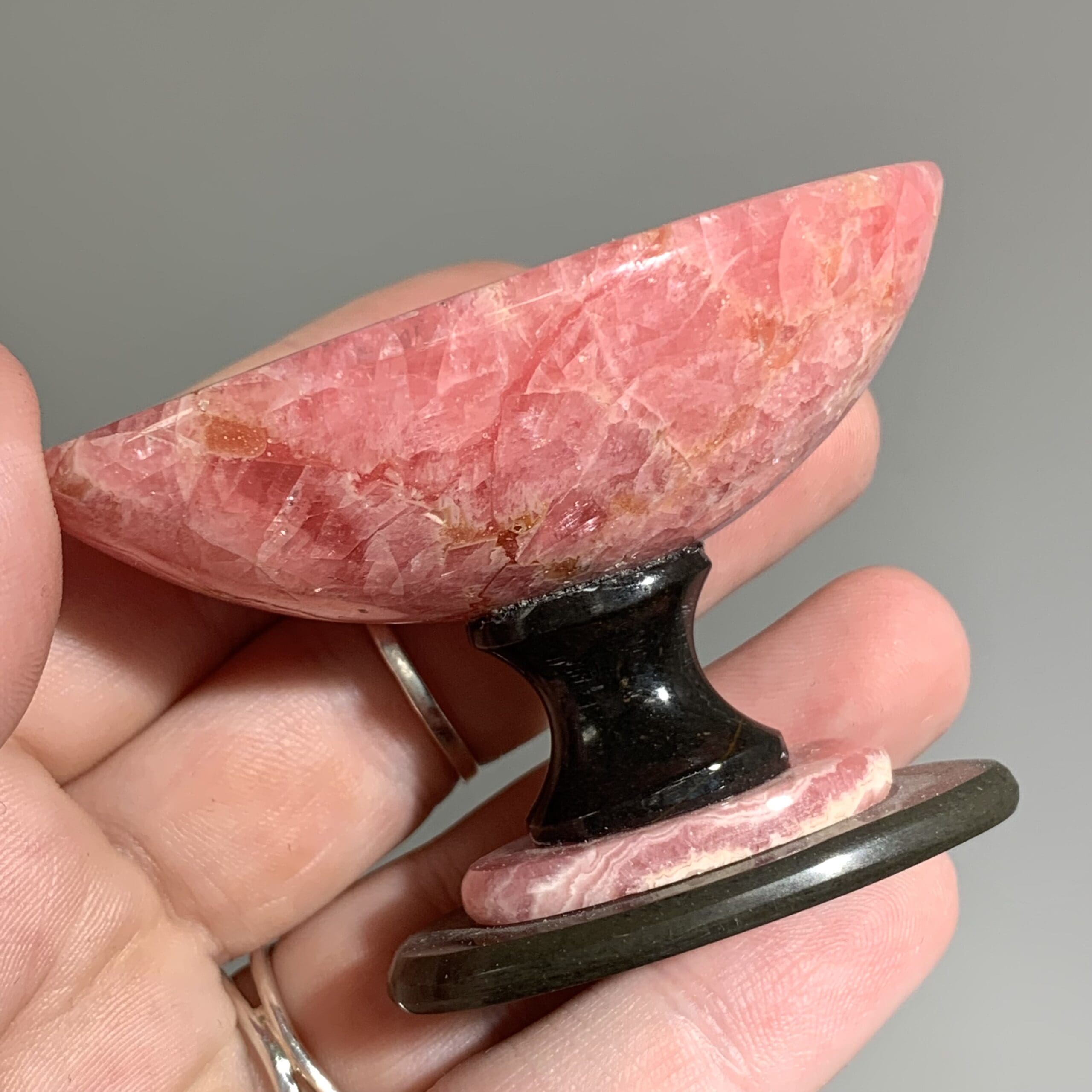 Rhodochrosite gemmy oval bowl w/ Basalt base healing crystal - Image 2