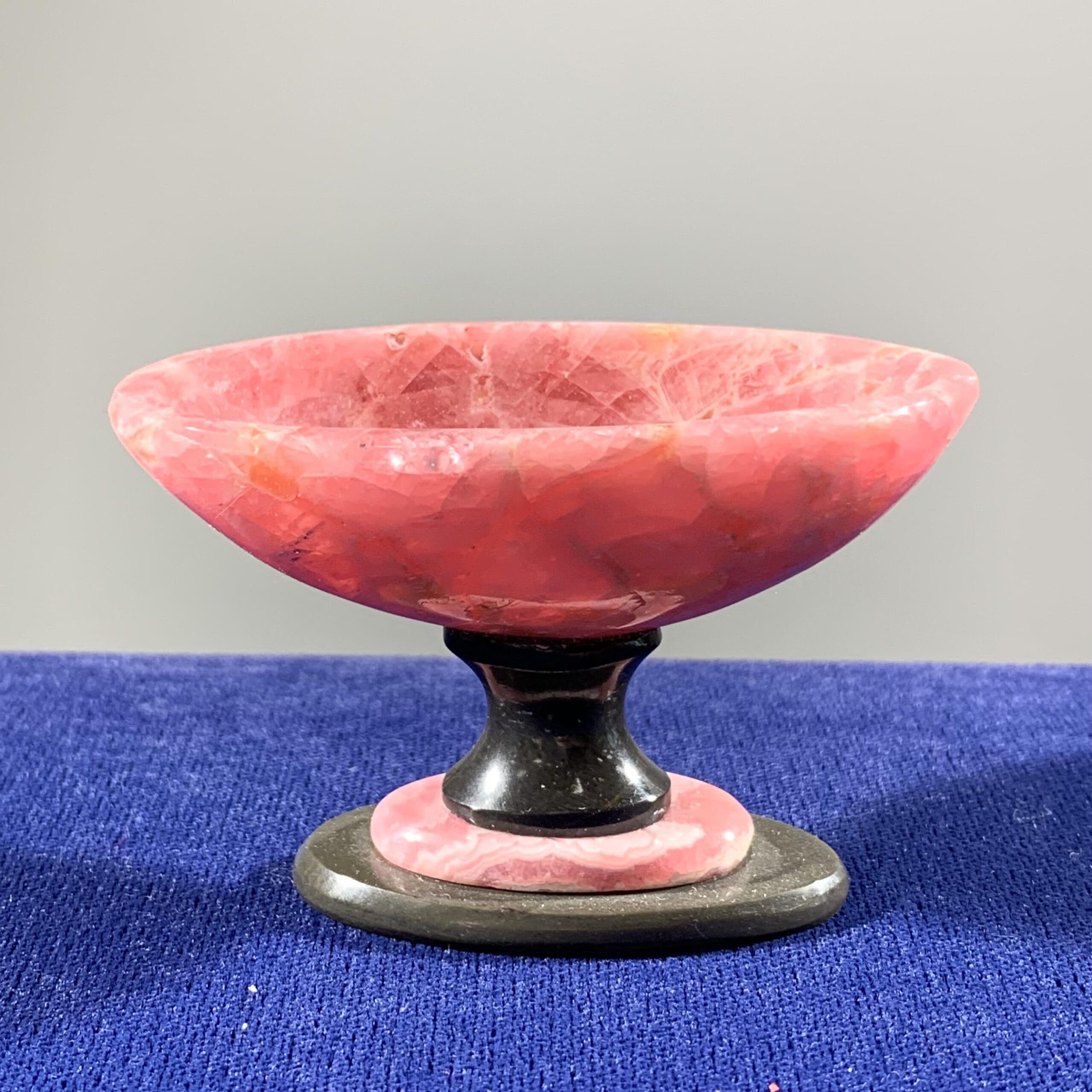 Rhodochrosite gemmy oval bowl w/ Basalt base healing crystal