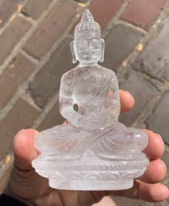 Buddha seated, in clear Quartz '2 hand cup' (240gr)
